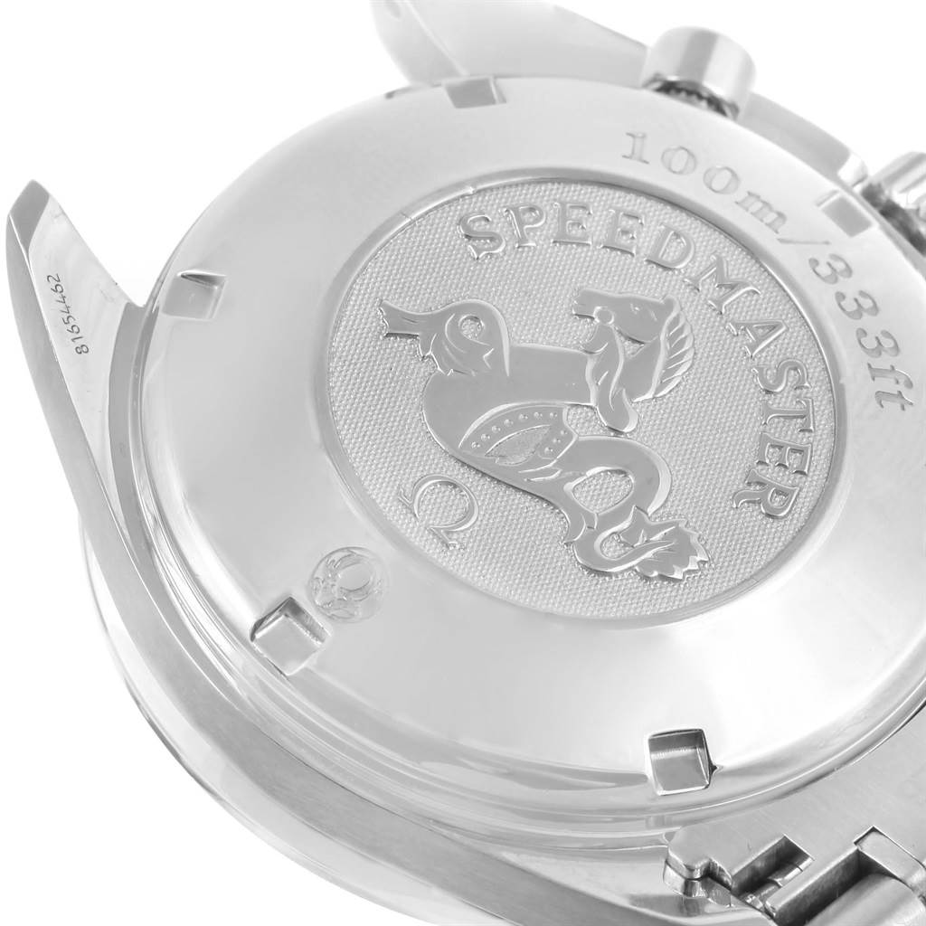 The image shows the back case of an Omega Speedmaster 3210.52.00 Men
s Stainless Steel Black Dial 3210.52.00 Men
s Stainless Steel Black Dial watch, highlighting the engraved logo and water resistance markings.