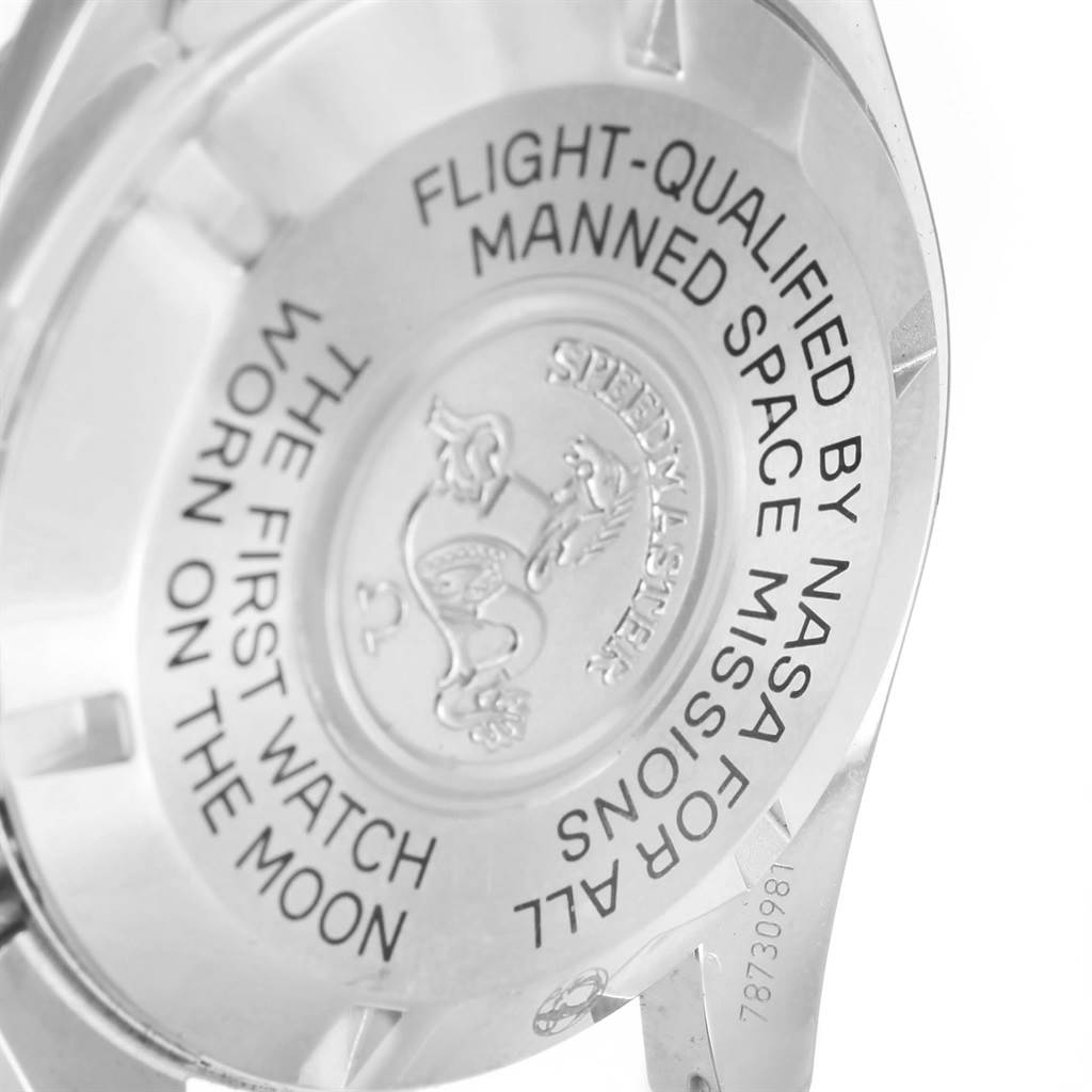 The image shows the back case of the Omega Speedmaster 311.30.42.30.01.005 Men
s Stainless Steel Black Dial 311.30.42.30.01.005 Men
s Stainless Steel Black Dial watch, highlighting engravings about NASA qualifications and the moon landing.