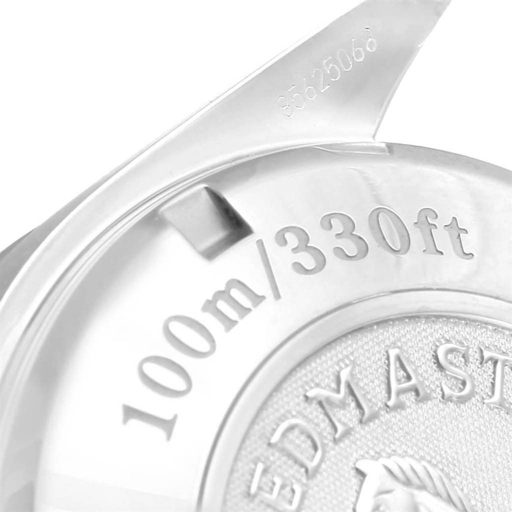 The image shows the back case of an Omega Speedmaster 323.30.40.40.06.001 Men's Stainless Steel Grey Dial 323.30.40.40.06.001 Men's Stainless Steel Grey Dial watch, highlighting the water resistance marking and part of the logo.