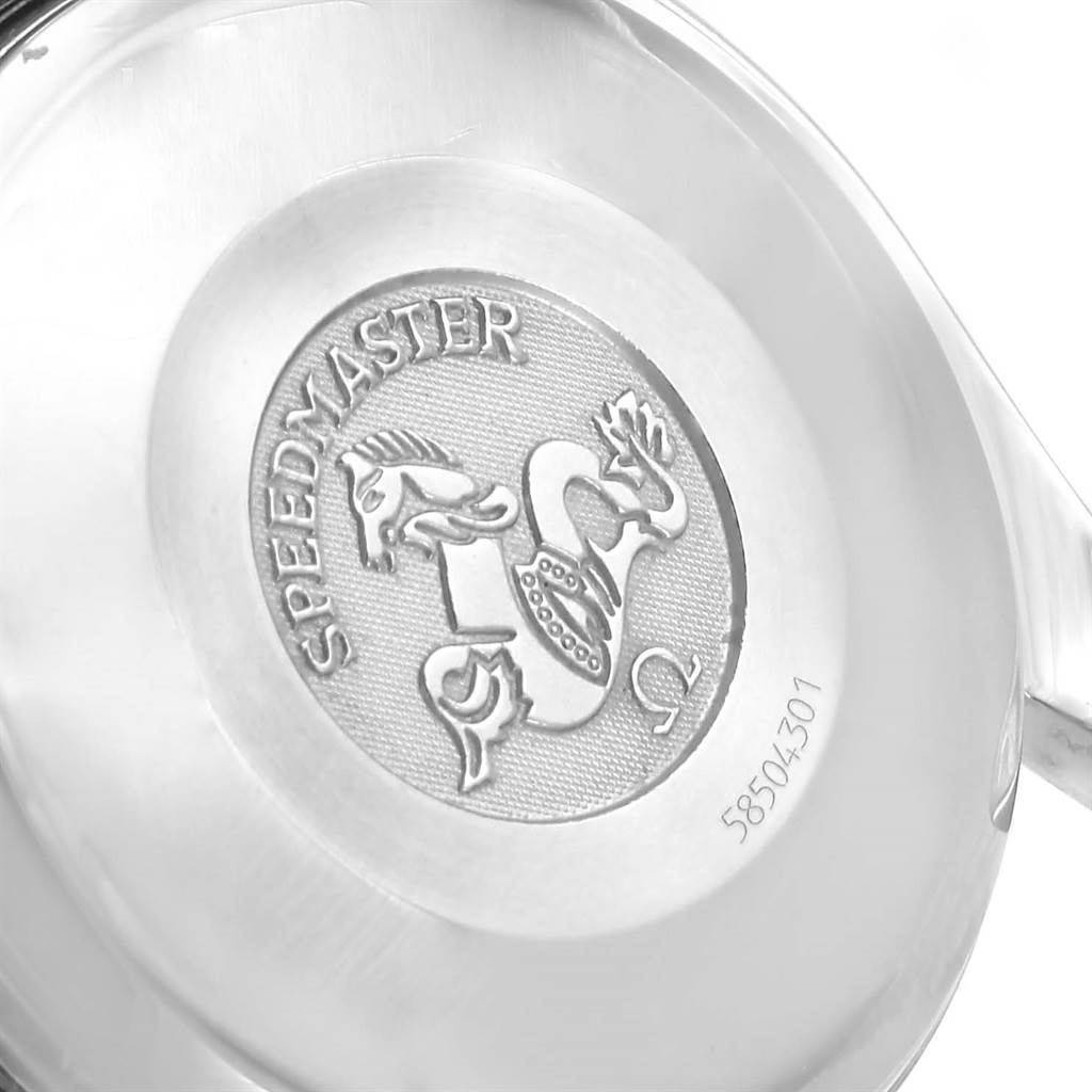 The image shows the back case of an Omega Speedmaster 3523.80.00 Men
s Stainless Steel Blue Dial 3523.80.00 Men
s Stainless Steel Blue Dial watch, highlighting the embossed emblem and serial number.