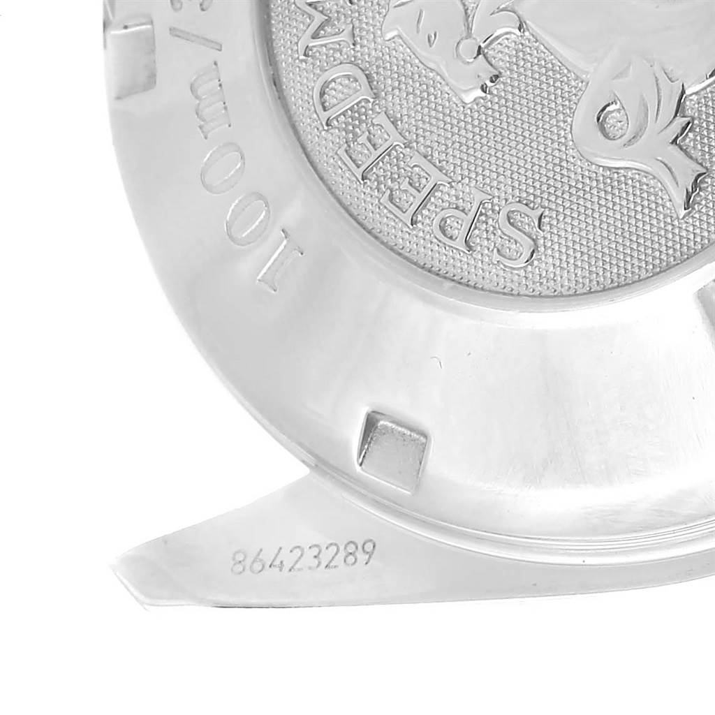 This image shows the case back of an Omega Speedmaster 3210.52.00 Men
s Stainless Steel Black Dial 3210.52.00 Men
s Stainless Steel Black Dial watch, displaying part of the engraved logo and serial number.