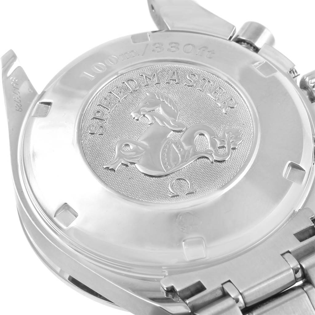 The image shows the backside of an Omega Speedmaster 3210.52.00 Men
s Stainless Steel Black Dial 3210.52.00 Men
s Stainless Steel Black Dial watch, highlighting its case back with embossed logo and water resistance marking.