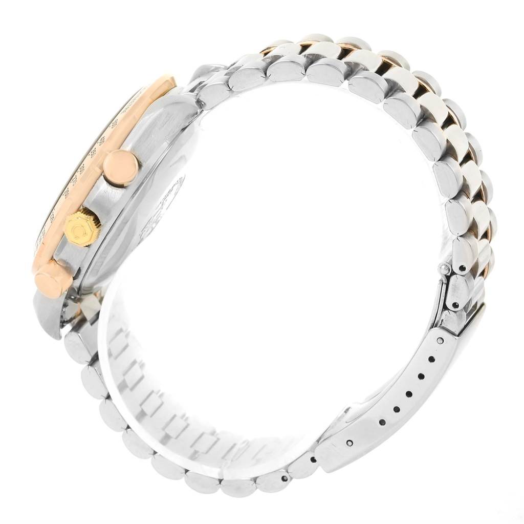 The image shows a side view of the Omega Speedmaster 3716.50.00 Men
s Steel and Gold (two tone) Black Dial 3716.50.00 Men
s Steel and Gold (two tone) Black Dial watch, capturing the case, crown, pushers, and part of the bracelet.