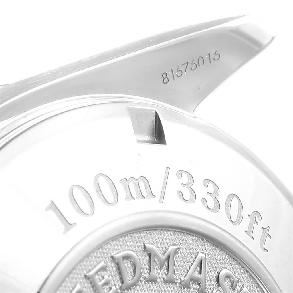 The image shows the back case of an Omega Speedmaster 3210.51.00 Men
s Stainless Steel Black Dial 3210.51.00 Men
s Stainless Steel Black Dial watch, highlighting its water resistance rating and partial serial number.