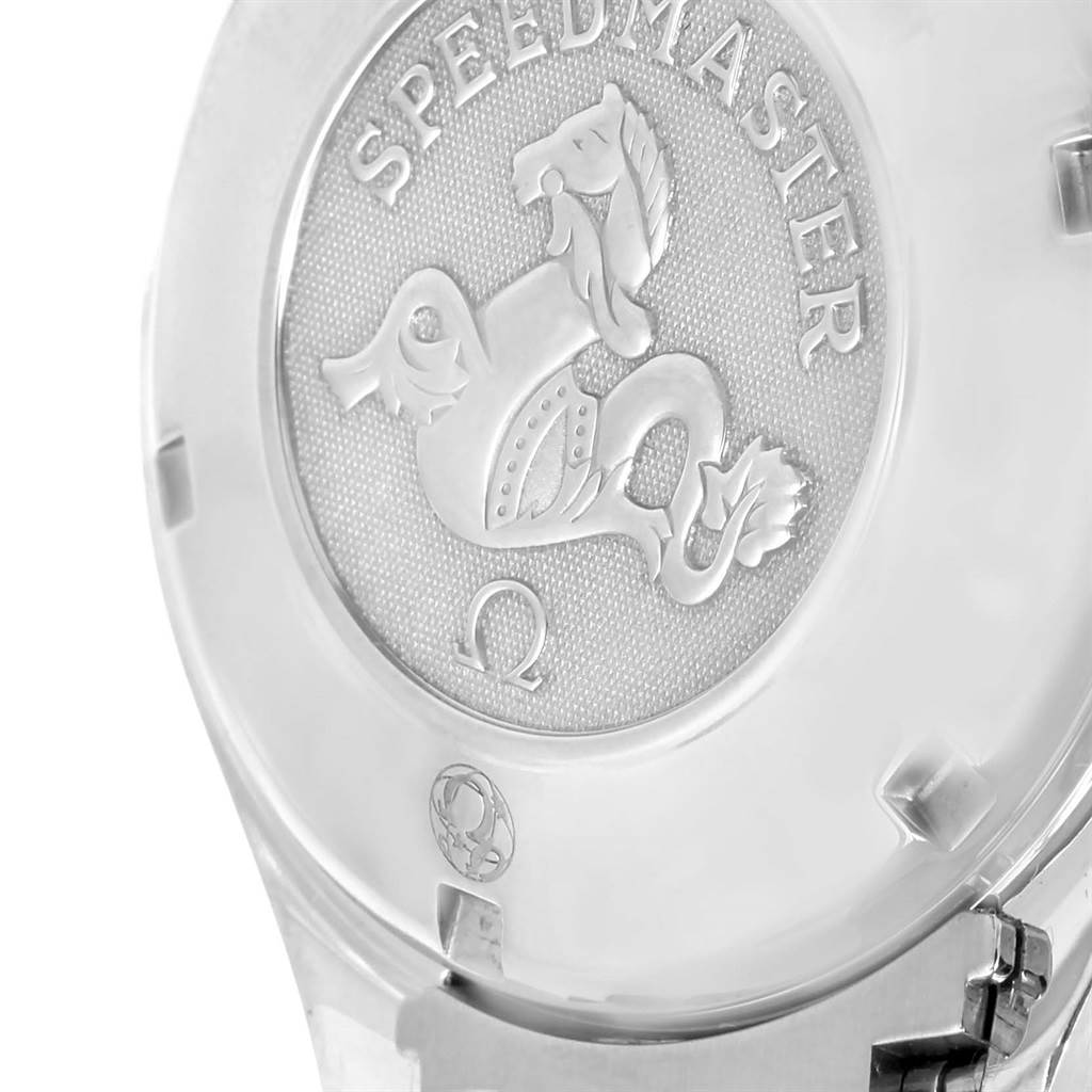 The image shows the back case of an Omega Speedmaster 3211.31.00 Men
s Stainless Steel Silver Dial 3211.31.00 Men
s Stainless Steel Silver Dial watch featuring the engraved logo.