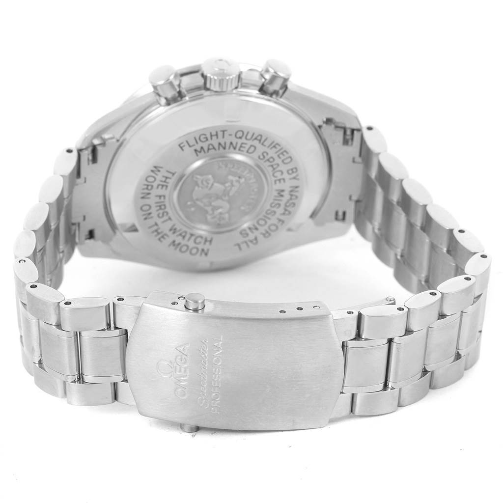 The image shows the back case and clasp of the Omega Speedmaster 3570.50.00 Men
s Stainless Steel Black Dial 3570.50.00 Men
s Stainless Steel Black Dial watch, with the bracelet and engraved case back visible.