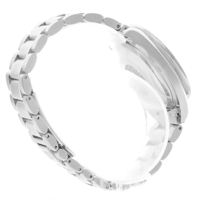 The image shows the side view of an Omega Speedmaster 3513.50.00 Men
s Stainless Steel Black Dial 3513.50.00 Men
s Stainless Steel Black Dial, focusing on the metal bracelet and partially visible watch case.