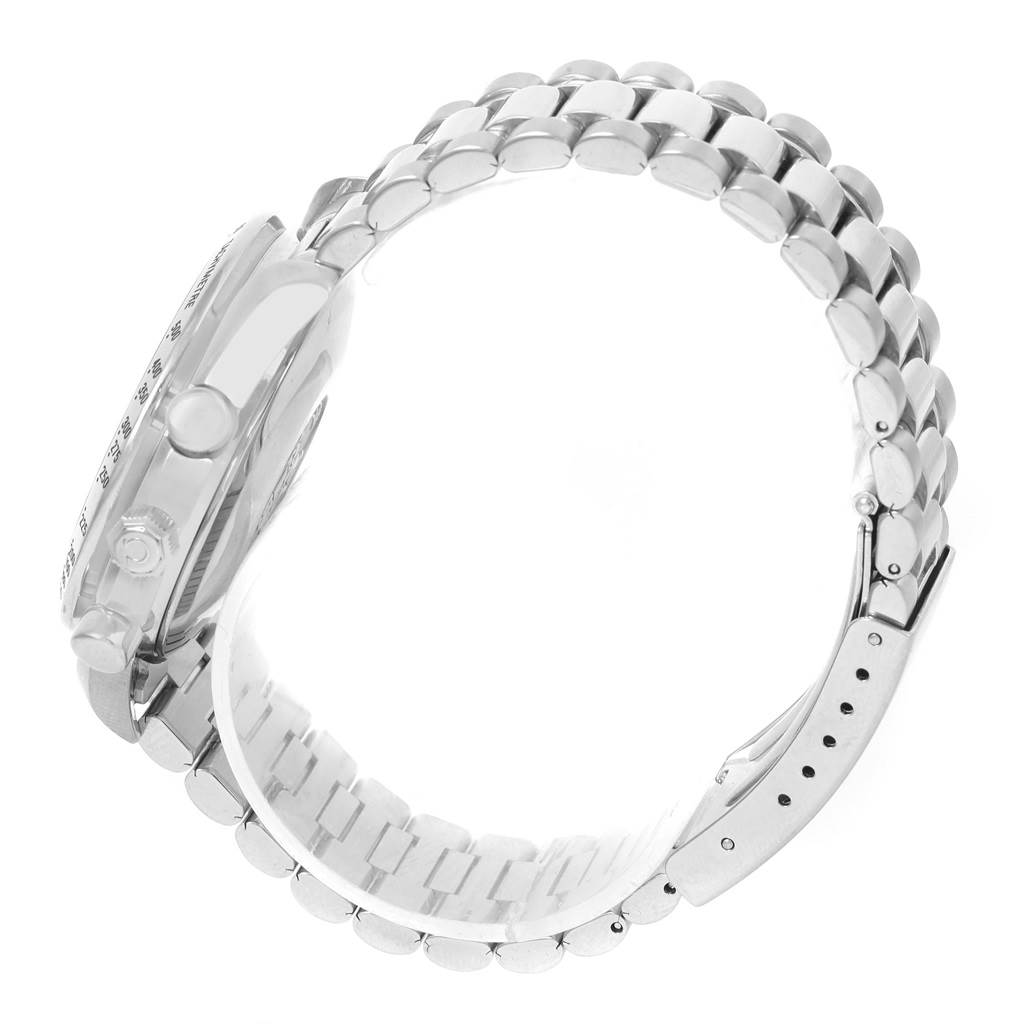 The image showcases a side view of an Omega Speedmaster 3521.80.00 Men
s Stainless Steel Blue Dial 3521.80.00 Men
s Stainless Steel Blue Dial watch, highlighting the stainless steel bracelet, clasp, and case.