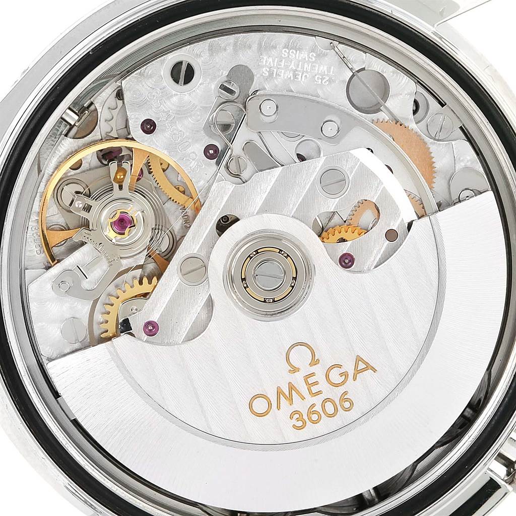 Close-up of the Omega Speedmaster 3220.50.00 Men
s Stainless Steel Black Dial 3220.50.00 Men
s Stainless Steel Black Dial watch
s movement, showcasing intricate gears and mechanical components.