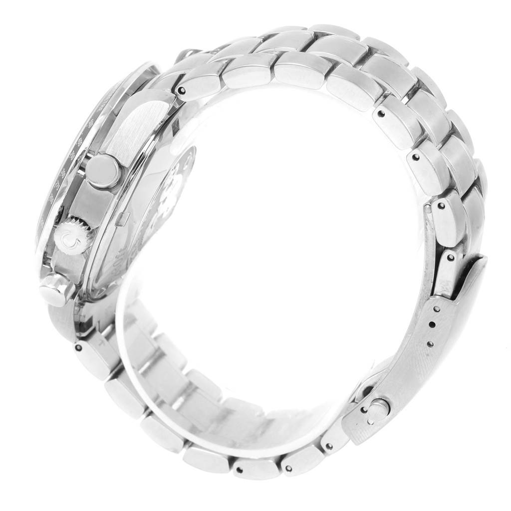 The image shows a side view of an Omega Speedmaster 3220.50.00 Men
s Stainless Steel Black Dial 3220.50.00 Men
s Stainless Steel Black Dial watch, highlighting its bracelet, crown, and pushers.