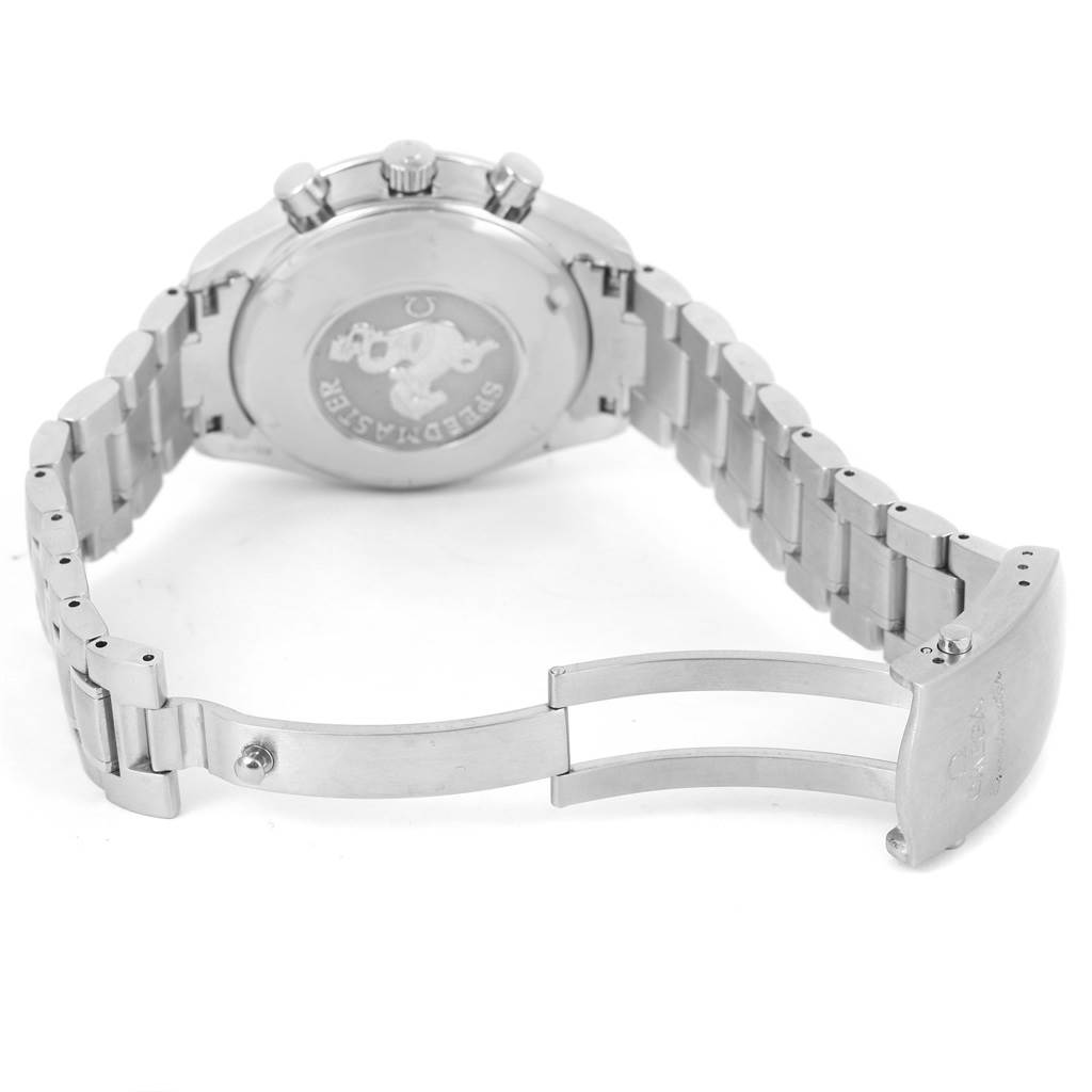 The image shows the backside and clasp of an Omega Speedmaster 3210.51.00 Men
s Stainless Steel Black Dial 3210.51.00 Men
s Stainless Steel Black Dial watch, with its bracelet partially open.