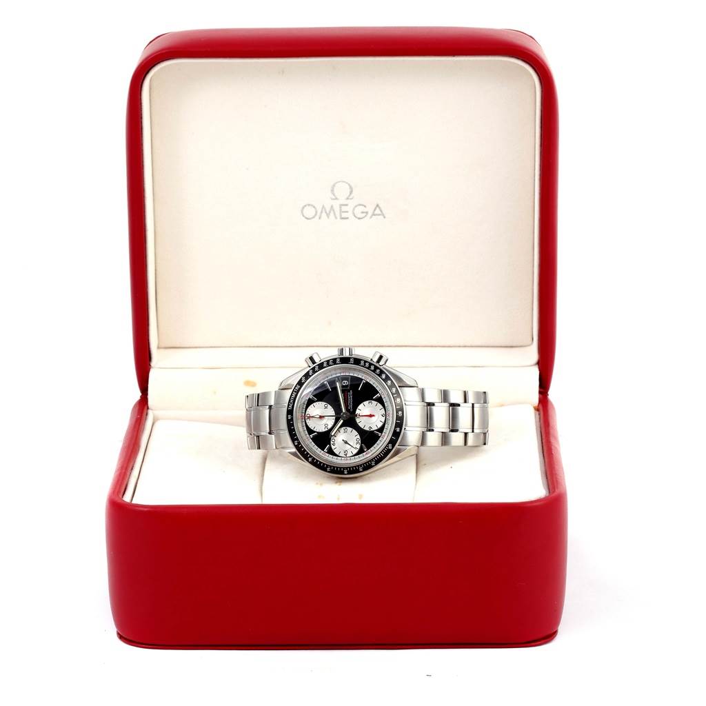 This is an Omega Speedmaster 3210.51.00 Men
s Stainless Steel Black Dial 3210.51.00 Men
s Stainless Steel Black Dial watch, shown at a front angle, with a stainless steel band, displayed in a red and white case.