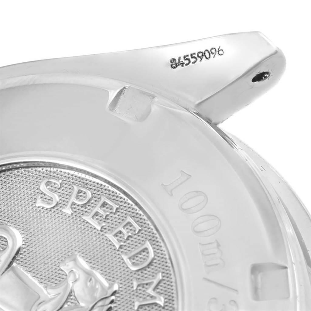 This image shows the engraved case back and a part of the lug of an Omega Speedmaster 3210.50.00 Men
s Stainless Steel Black Dial 3210.50.00 Men
s Stainless Steel Black Dial watch.