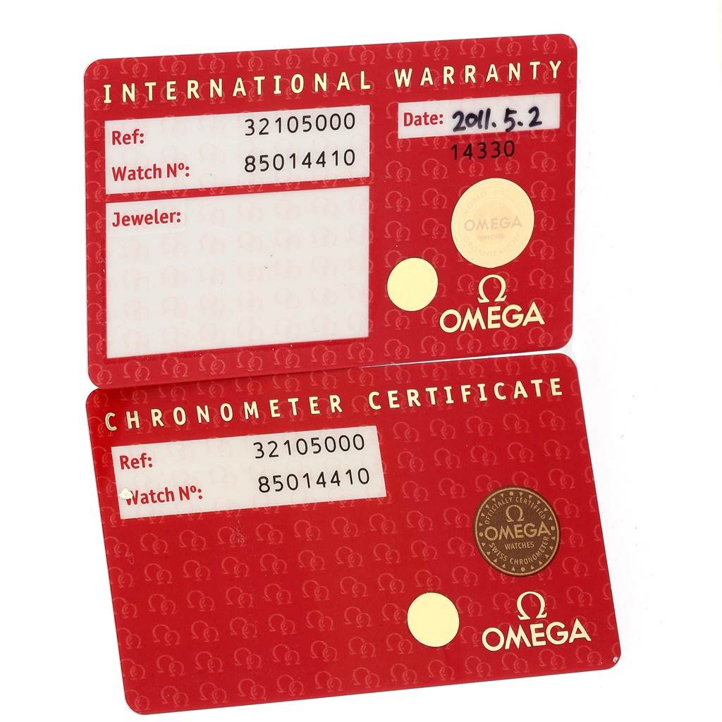 The image shows the International Warranty and Chronometer Certificate cards for the Omega Speedmaster 3210.50.00 Men
s Stainless Steel Black Dial 3210.50.00 Men
s Stainless Steel Black Dial.