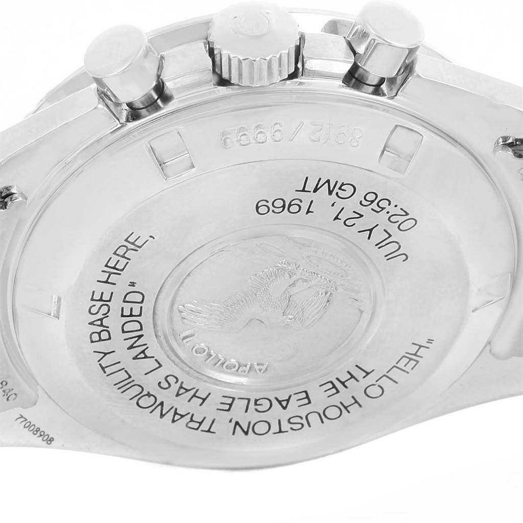 This image shows the back case and crown of the Omega Speedmaster 3560.50.00 Men
s Stainless Steel Black Dial 3560.50.00 Men
s Stainless Steel Black Dial, highlighting the engraved text and emblem.