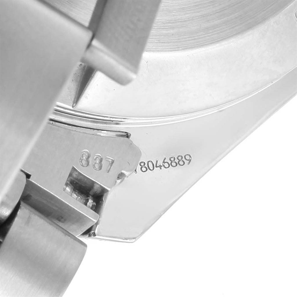 The image shows a close-up of the clasp and part of the back casing of an Omega Speedmaster 3551.50.00 Men
s Stainless Steel Black Dial 3551.50.00 Men
s Stainless Steel Black Dial watch, highlighting its serial number.