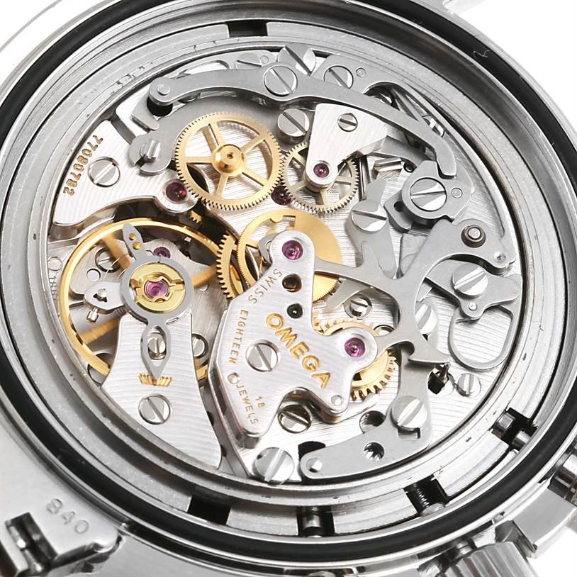 The image shows a close-up view of the movement mechanism of an Omega Speedmaster 3570.50.00 Men
s Stainless Steel Black Dial 3570.50.00 Men
s Stainless Steel Black Dial watch.