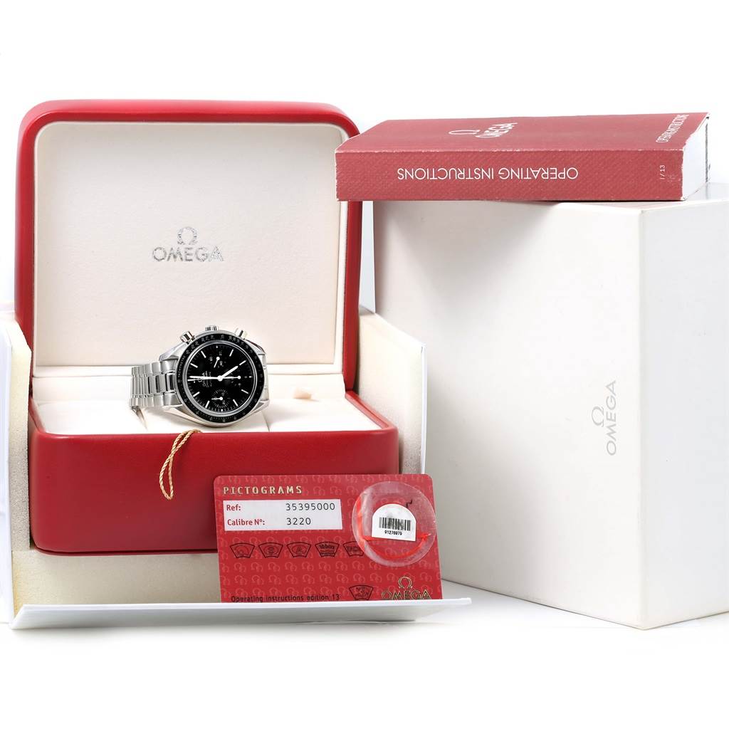 The Omega Speedmaster 3539.50.00 Men
s Stainless Steel Black Dial 3539.50.00 Men
s Stainless Steel Black Dial watch is shown with its box, warranty card, and operating instructions booklet.
