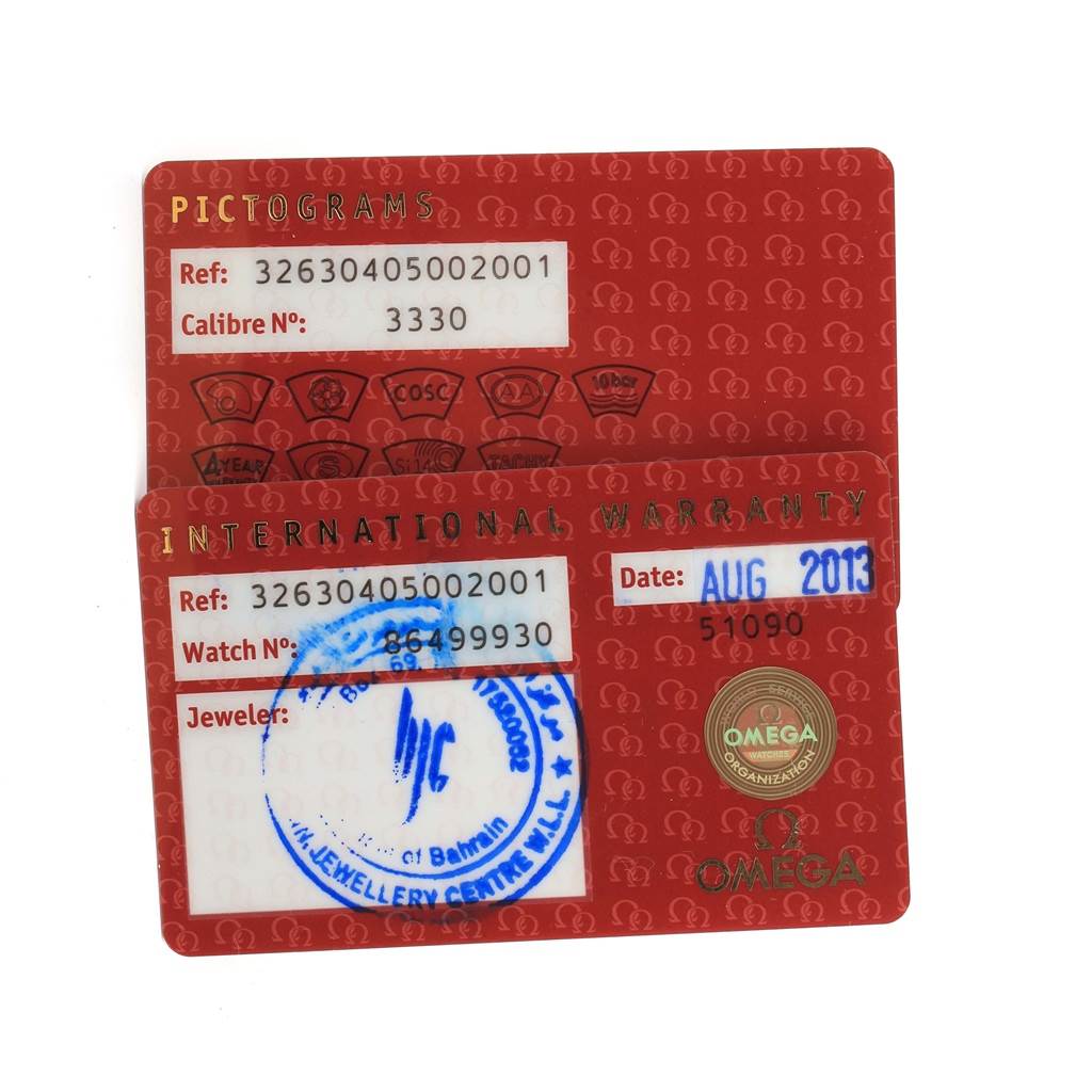 The image shows warranty cards for the Omega Speedmaster 326.30.40.50.02.001 Men
s Stainless Steel White Dial 326.30.40.50.02.001 Men
s Stainless Steel White Dial watch, displaying reference numbers, caliber, and date of purchase.