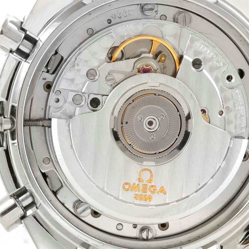 This close-up captures the back of the Omega Speedmaster 3510.50.00 Men
s Stainless Steel Black Dial 3510.50.00 Men
s Stainless Steel Black Dial watch, showcasing its intricate movement and Omega 3220 markings.