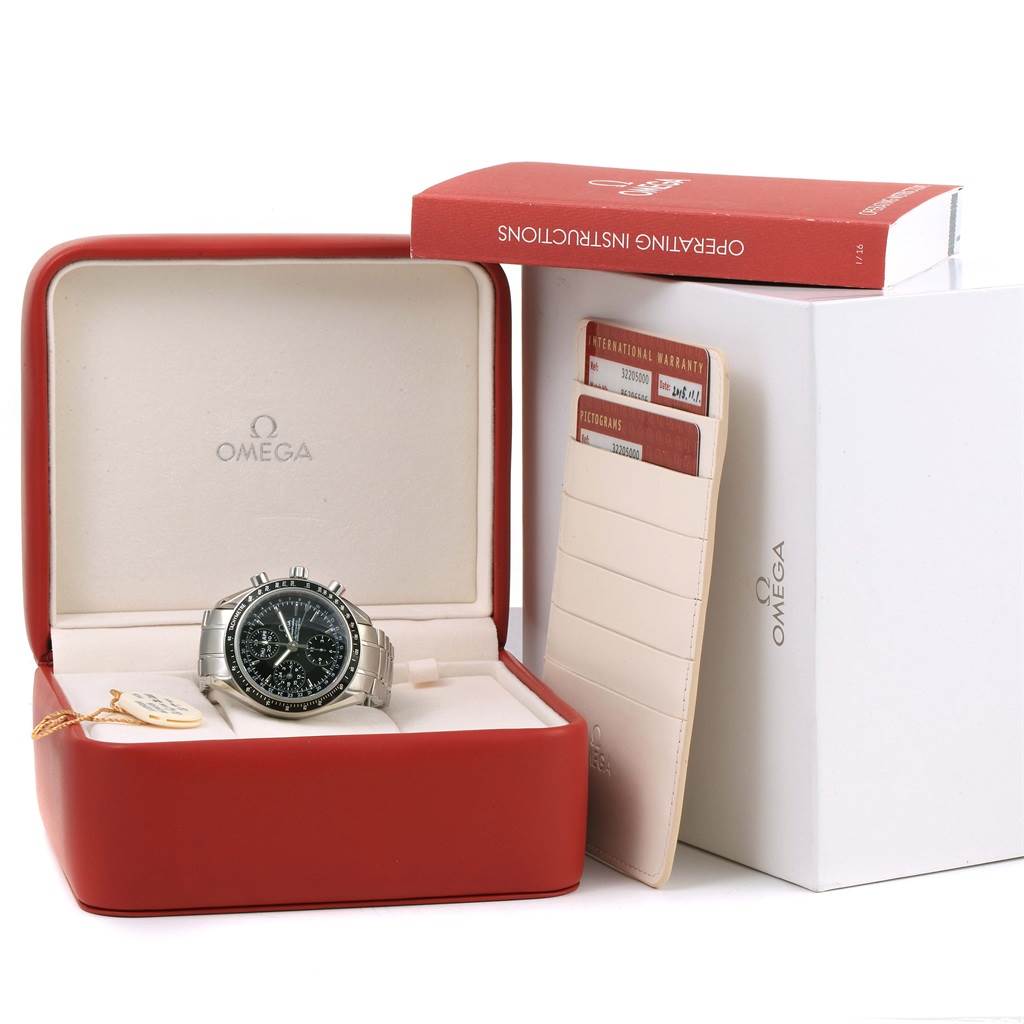 The Omega Speedmaster 3220.50.00 Men
s Stainless Steel Black Dial 3220.50.00 Men
s Stainless Steel Black Dial watch is displayed in an open box, accompanied by warranty cards and an operating instructions booklet.