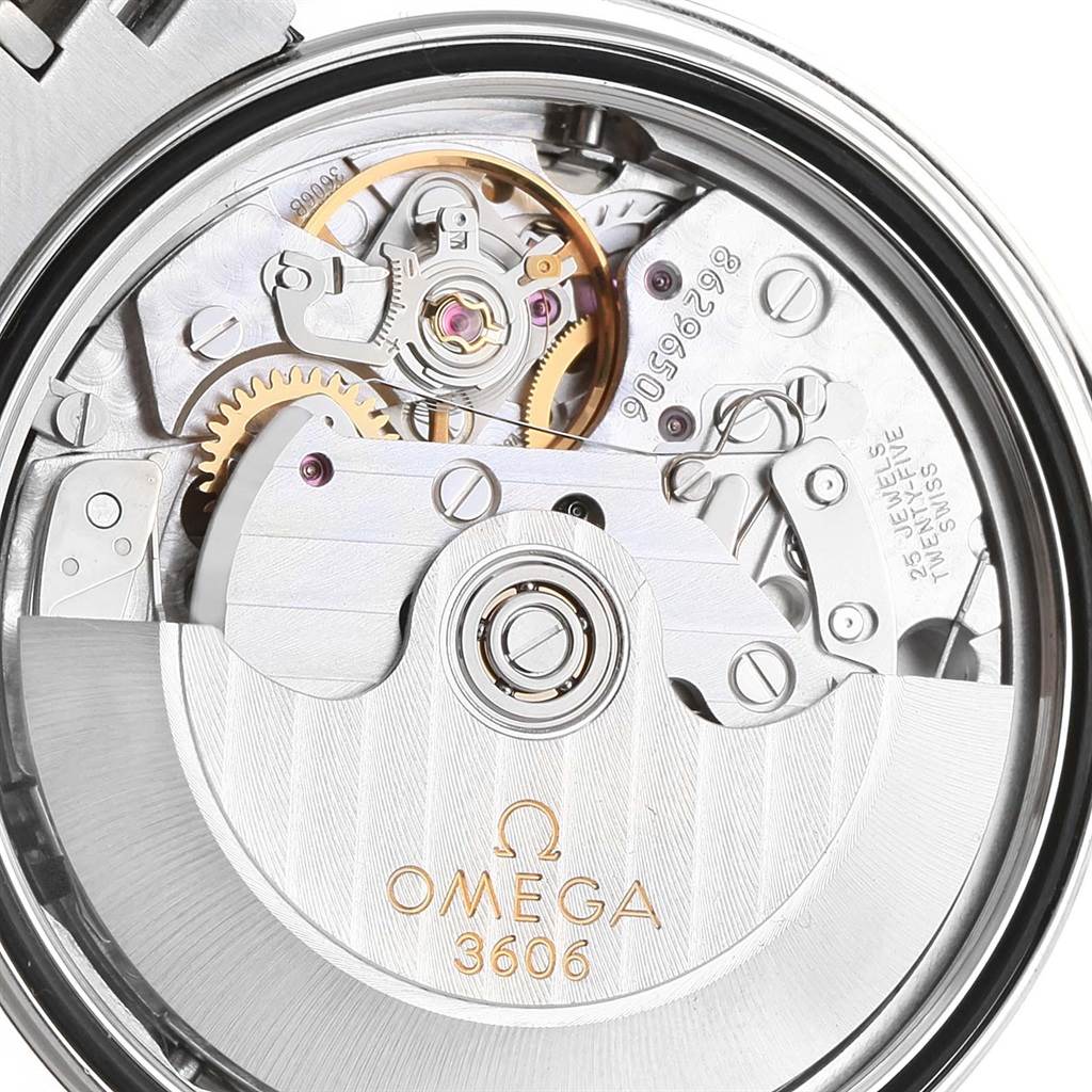 The image shows the intricate movement mechanism of an Omega Speedmaster 3220.50.00 Men
s Stainless Steel Black Dial 3220.50.00 Men
s Stainless Steel Black Dial watch, viewed from the back.
