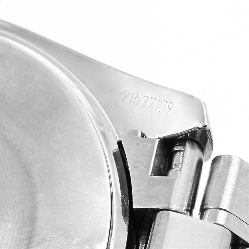 This image shows a close-up of the case back and part of the bracelet assembly of an Omega Speedmaster 3539.50.00 Men
s Stainless Steel Black Dial 3539.50.00 Men
s Stainless Steel Black Dial watch.