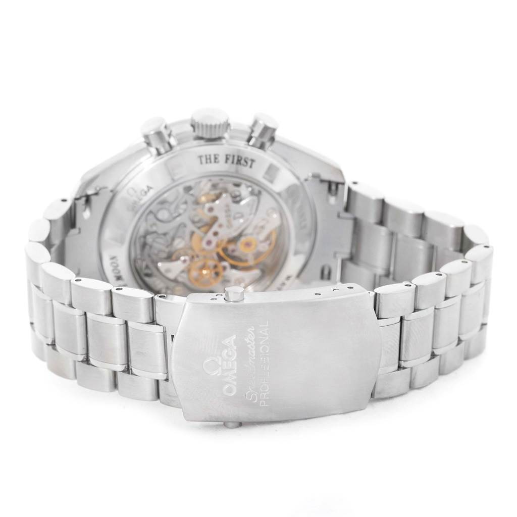 The image shows the back of an Omega Speedmaster 3576.50.00 Men
s Stainless Steel Black Dial 3576.50.00 Men
s Stainless Steel Black Dial watch, highlighting the clasp, bracelet, and transparent caseback revealing the movement.