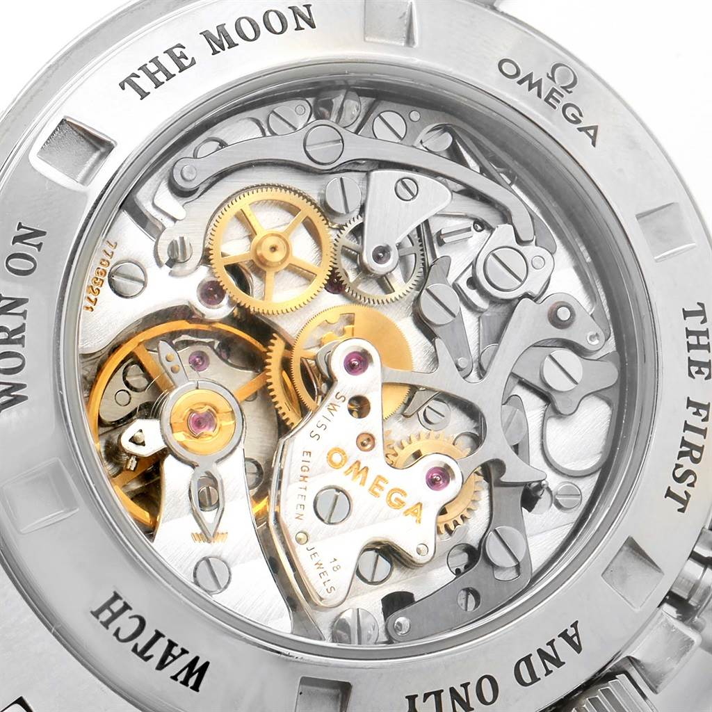 This is a close-up view of the Omega Speedmaster 3576.50.00 Men
s Stainless Steel Black Dial 3576.50.00 Men
s Stainless Steel Black Dial watch
s exposed mechanical movement through its transparent case back.