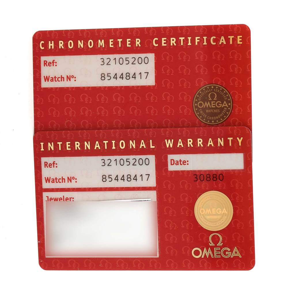 The image shows the Chronometer Certificate and International Warranty cards for an Omega Speedmaster 3210.52.00 Men
s Stainless Steel Black Dial 3210.52.00 Men
s Stainless Steel Black Dial watch.