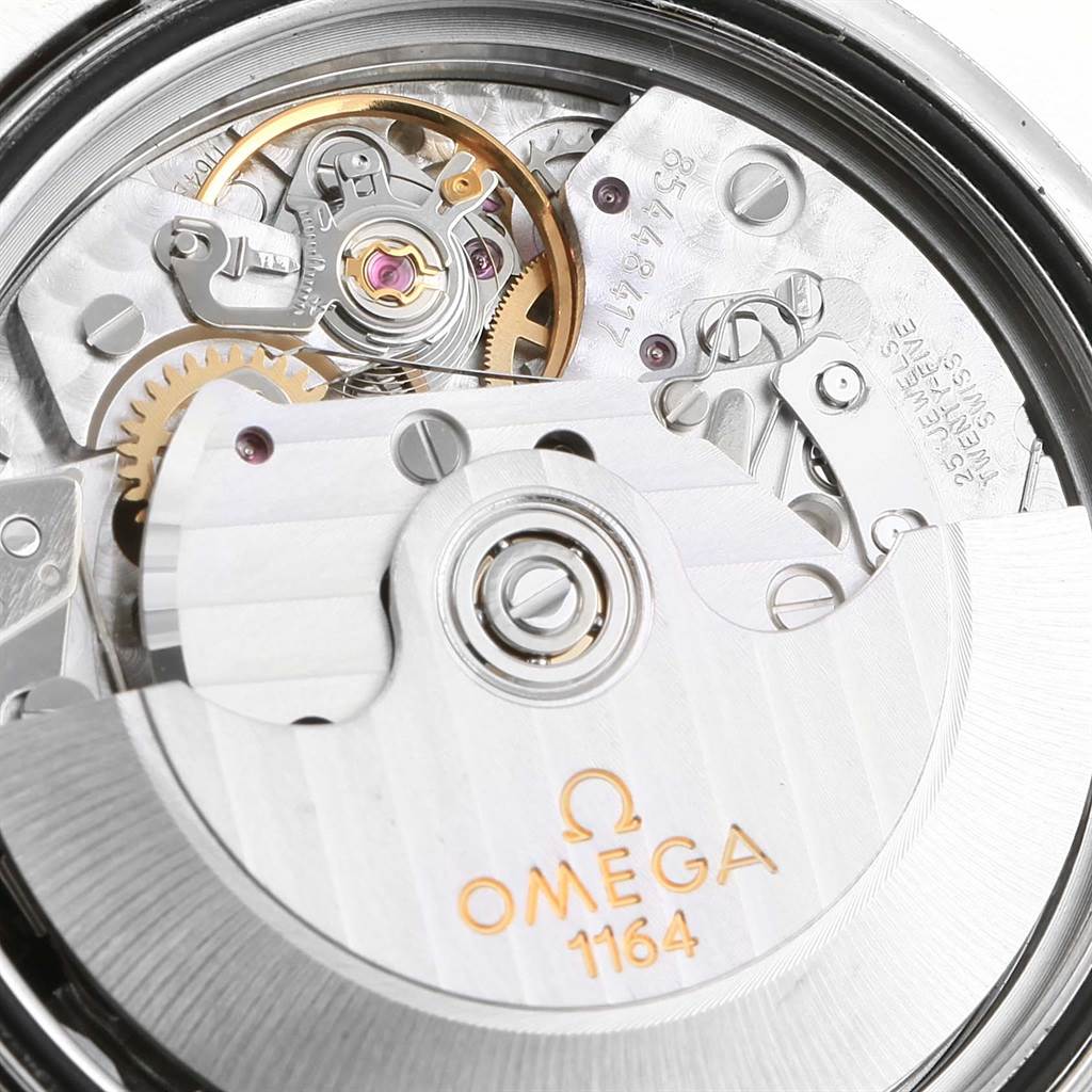 This image shows the intricate movement and inner mechanisms of the Omega Speedmaster 3210.52.00 Men
s Stainless Steel Black Dial 3210.52.00 Men
s Stainless Steel Black Dial watch, including the rotor and gears.