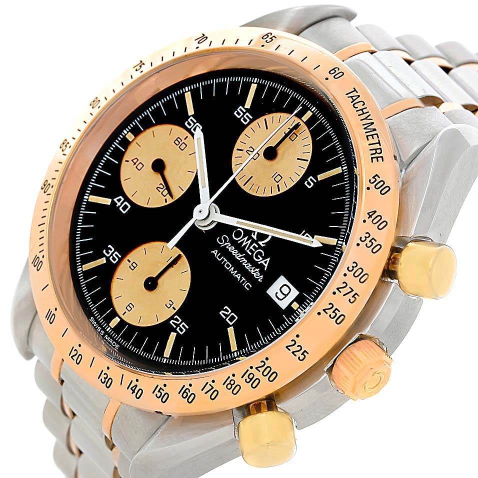 The image shows an angled view of an Omega Speedmaster 3716.50.00 Men
s Steel and Gold (two tone) Black Dial 3716.50.00 Men
s Steel and Gold (two tone) Black Dial watch, highlighting its face, bezel, crown, and chronograph pushers.