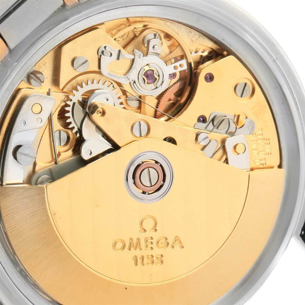 This image shows the internal mechanical movement of an Omega Speedmaster 3716.50.00 Men
s Steel and Gold (two tone) Black Dial 3716.50.00 Men
s Steel and Gold (two tone) Black Dial watch from a rear angle.