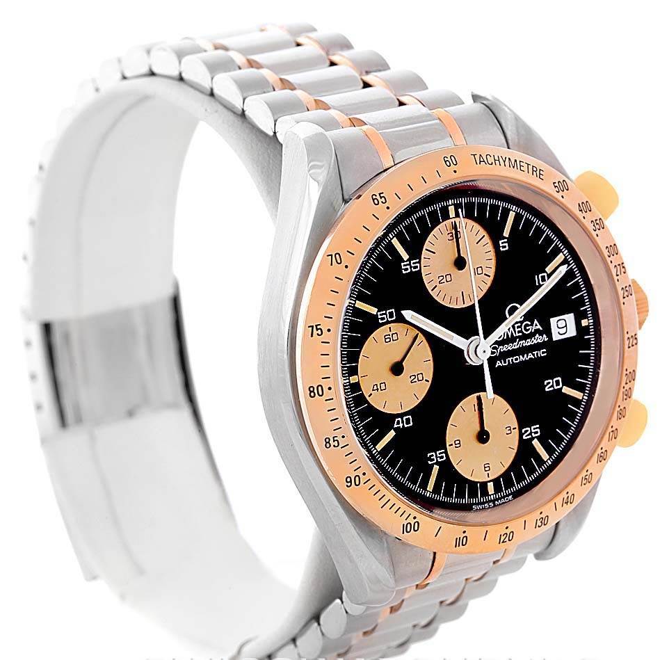 The Omega Speedmaster 3716.50.00 Men
s Steel and Gold (two tone) Black Dial 3716.50.00 Men
s Steel and Gold (two tone) Black Dial watch is shown at an angle highlighting its face, bezel, and bracelet.