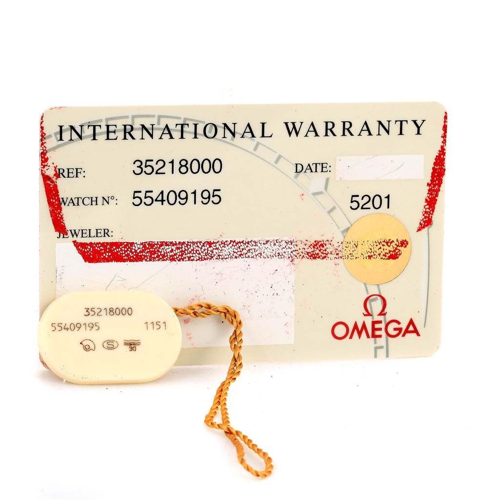The image shows the international warranty card and tag for an Omega Speedmaster 3521.80.00 Men
s Blue Dial 3521.80.00 Men
s Blue Dial watch.