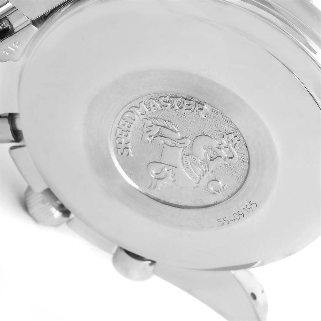 This image shows the back case of an Omega Speedmaster 3521.80.00 Men
s Blue Dial 3521.80.00 Men
s Blue Dial watch at an angle, highlighting the engraved logo and serial number.