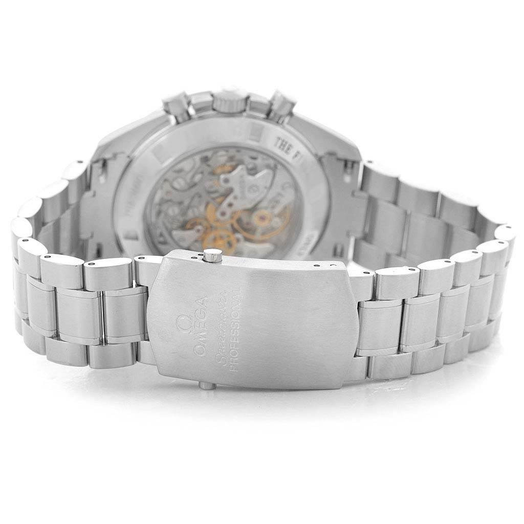 The image shows the back and bracelet of an Omega Speedmaster 3573.50.00 Men
s Stainless Steel Black Dial 3573.50.00 Men
s Stainless Steel Black Dial watch, highlighting the clasp and exposed movement.