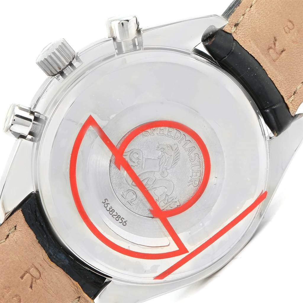 The image shows the backside of an Omega Speedmaster 3823.30.00 Men
s Stainless Steel Silver Dial 3823.30.00 Men
s Stainless Steel Silver Dial watch, including its case back and leather strap connection.