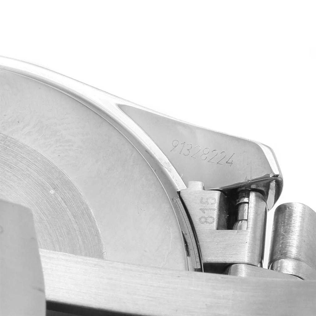 The image shows a close-up of the clasp and part of the caseback of an Omega Speedmaster 3539.50.00 Men
s Stainless Steel Black Dial 3539.50.00 Men
s Stainless Steel Black Dial watch.