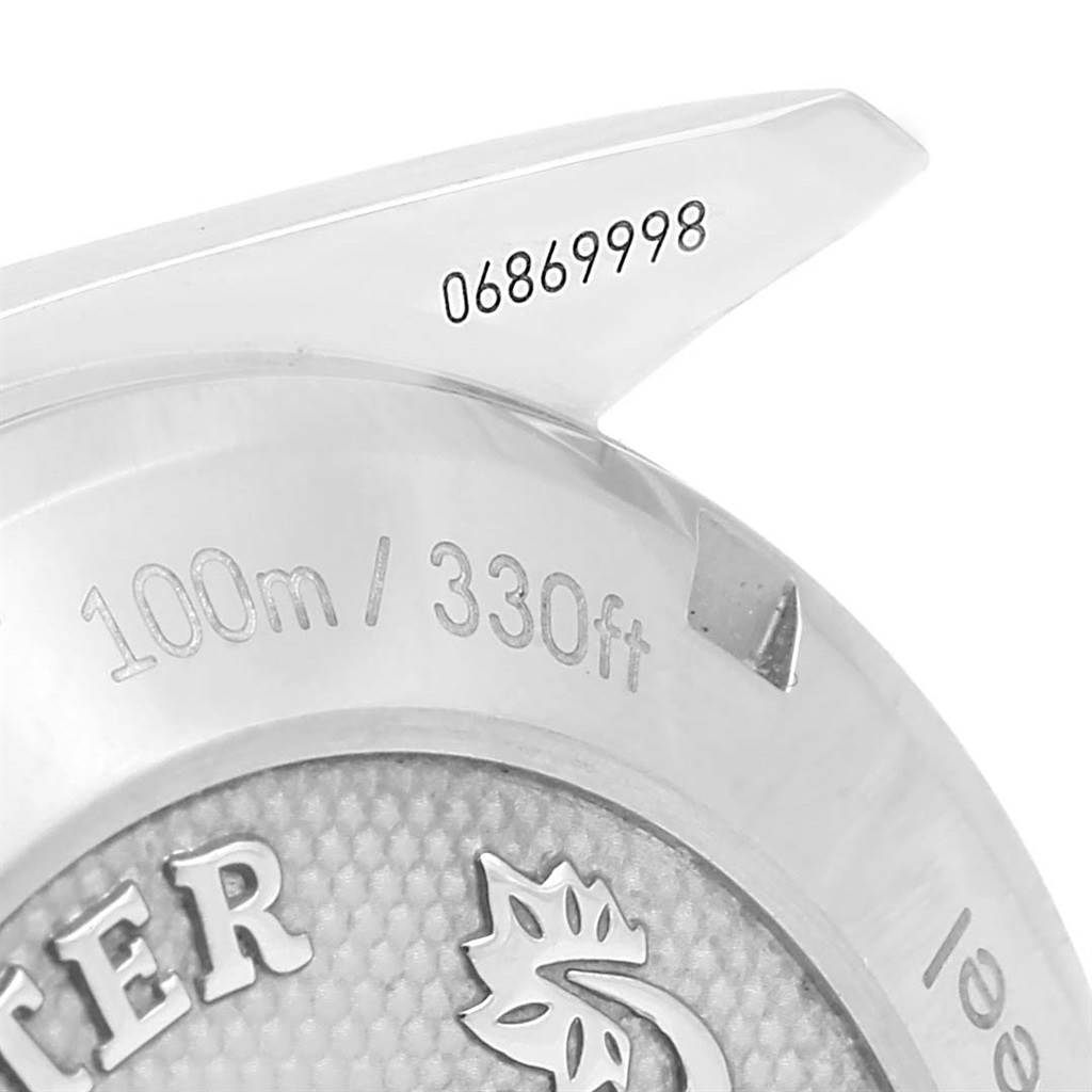 This image shows a close-up view of the back casing and lug of the Omega Speedmaster 326.30.40.50.03.001 Men
s Stainless Steel Blue Dial 326.30.40.50.03.001 Men
s Stainless Steel Blue Dial watch, highlighting water resistance and serial number.