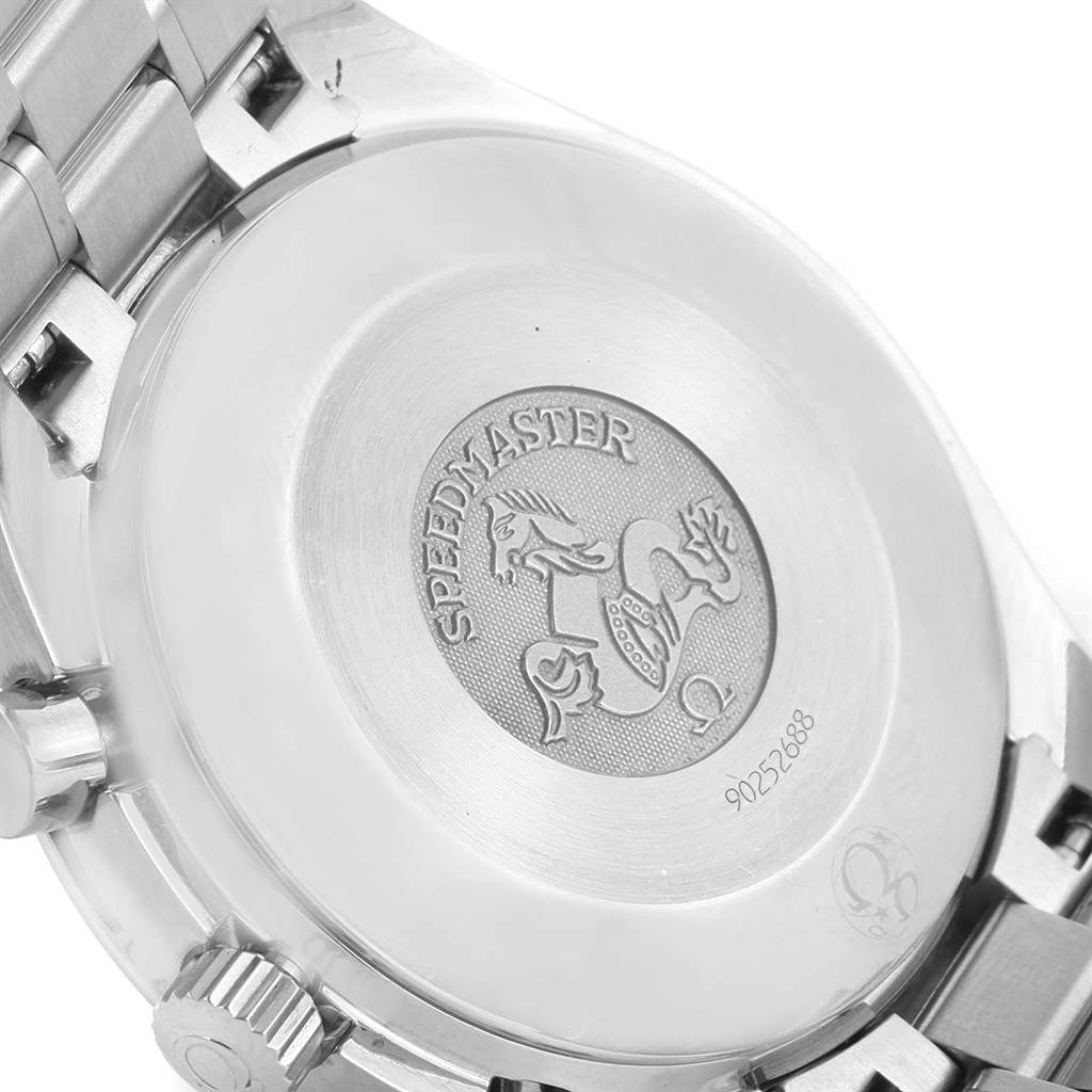 The image shows the case back of the Omega Speedmaster 3539.50.00 Men
s Stainless Steel Black Dial 3539.50.00 Men
s Stainless Steel Black Dial watch at a slight angle, highlighting the engraved logo and serial number.