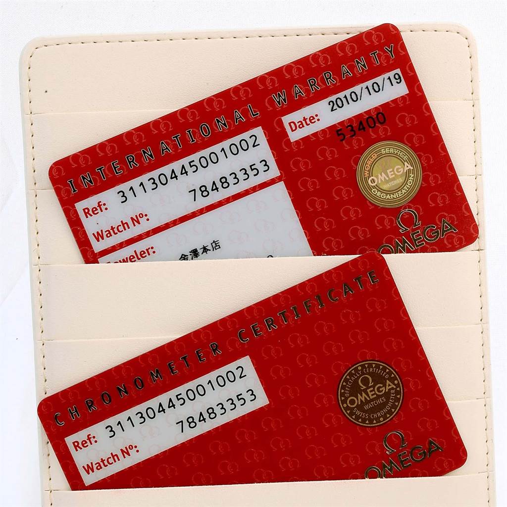 The image shows International Warranty and Chronometer Certificate cards for an Omega Speedmaster 311.30.44.50.01.002 Men's Stainless Steel Black Dial 311.30.44.50.01.002 Men's Stainless Steel Black Dial watch.