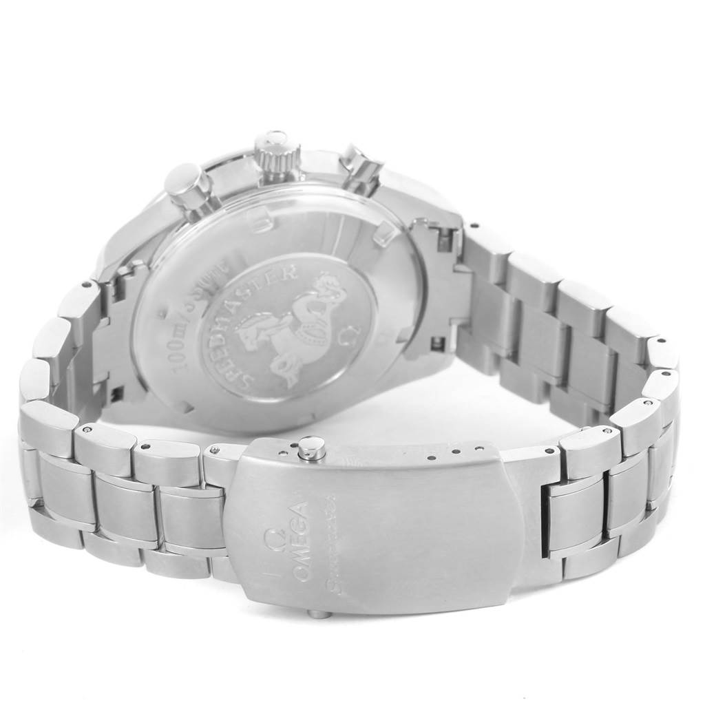 The image shows the back case and clasp of an Omega Speedmaster 3210.52.00 Men
s Stainless Steel Black Dial 3210.52.00 Men
s Stainless Steel Black Dial watch at an angle revealing the bracelet and adjustment pins.