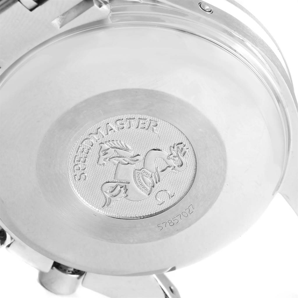 This image shows the case back of an Omega Speedmaster 3523.30.00 Men
s Stainless Steel Silver Dial 3523.30.00 Men
s Stainless Steel Silver Dial watch with an engraved logo and serial number.