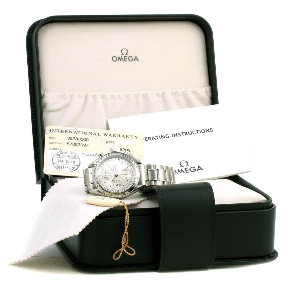 The Omega Speedmaster 3523.30.00 Men
s Stainless Steel Silver Dial 3523.30.00 Men
s Stainless Steel Silver Dial watch is displayed in its open case, along with warranty and instruction documents.