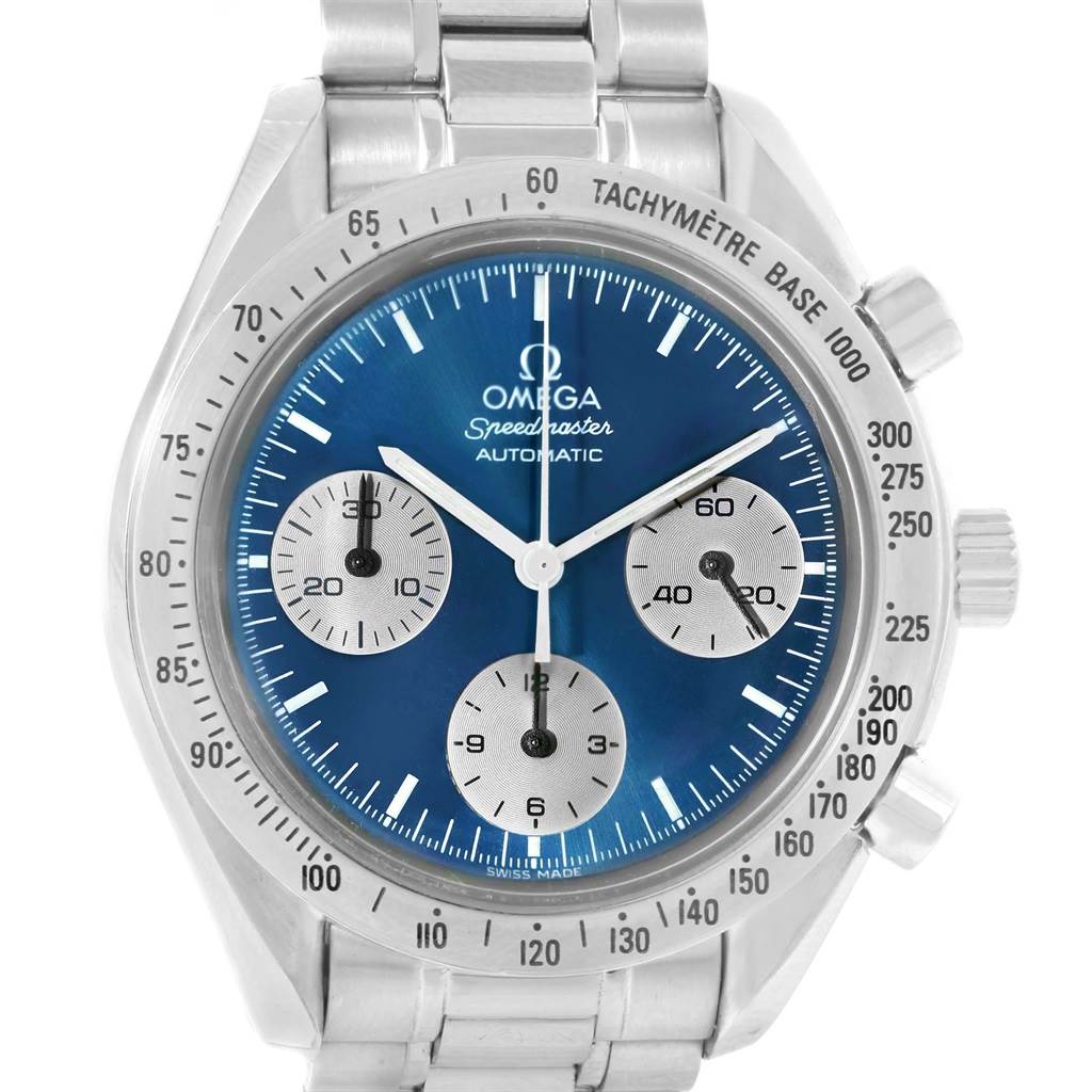 The image shows a frontal view of an Omega Speedmaster 3510.82.00 Men
s Stainless Steel Blue Dial 3510.82.00 Men
s Stainless Steel Blue Dial watch, highlighting its blue dial, tachymeter, and three subdials.