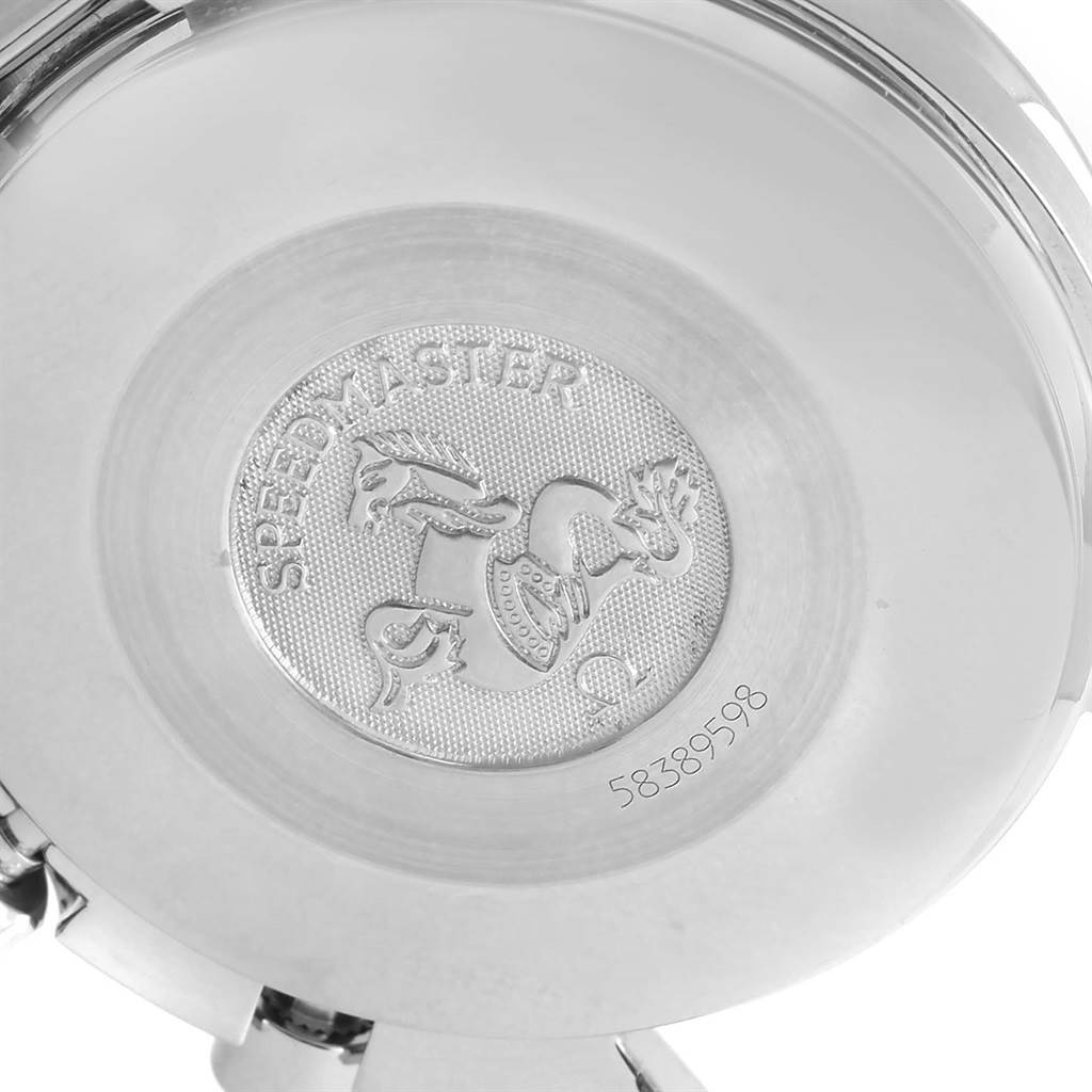 The image shows the engraved back case of an Omega Speedmaster 3510.82.00 Men
s Stainless Steel Blue Dial 3510.82.00 Men
s Stainless Steel Blue Dial watch, displaying the emblem and model
s name.