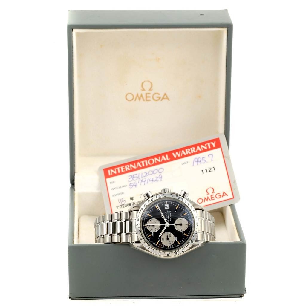The Omega Speedmaster 3511.20.00 Men
s Stainless Steel Black Dial 3511.20.00 Men
s Stainless Steel Black Dial watch is shown inside its open box with an International Warranty card.
