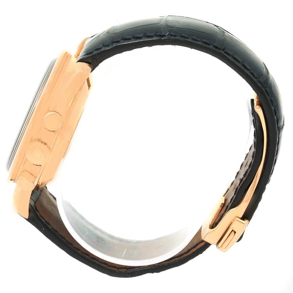 The image shows a side view of an Omega Speedmaster 178.0022 Men's Blue Dial 178.0022 Men's Blue Dial watch, highlighting the case, buttons, and leather strap.