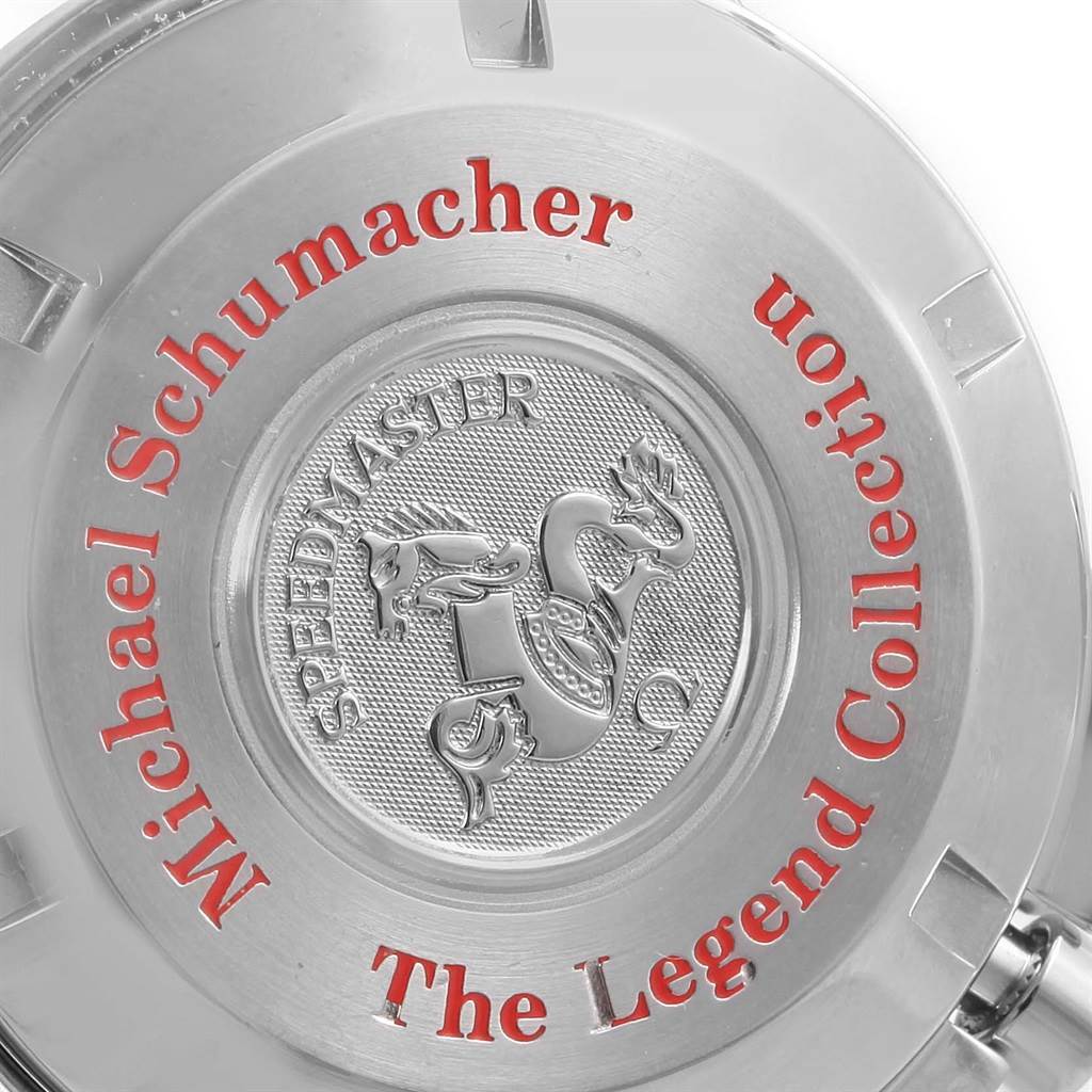 The image shows the caseback of an Omega Speedmaster 3506.61.00 Men's Stainless Steel Red Dial 3506.61.00 Men's Stainless Steel Red Dial watch from "The Legend Collection Michael Schumacher."